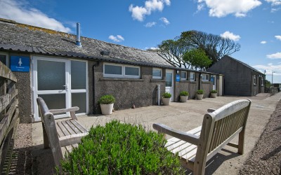 Toilet and shower block, laundry room and information room
